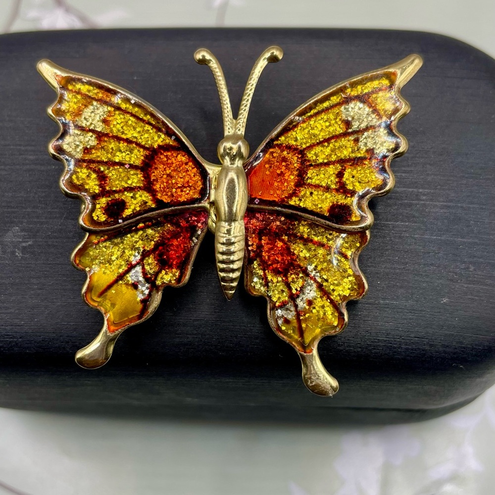 Gold and Orange Glitter Butterfly Brooch with Enamel Detailing. Gold tone